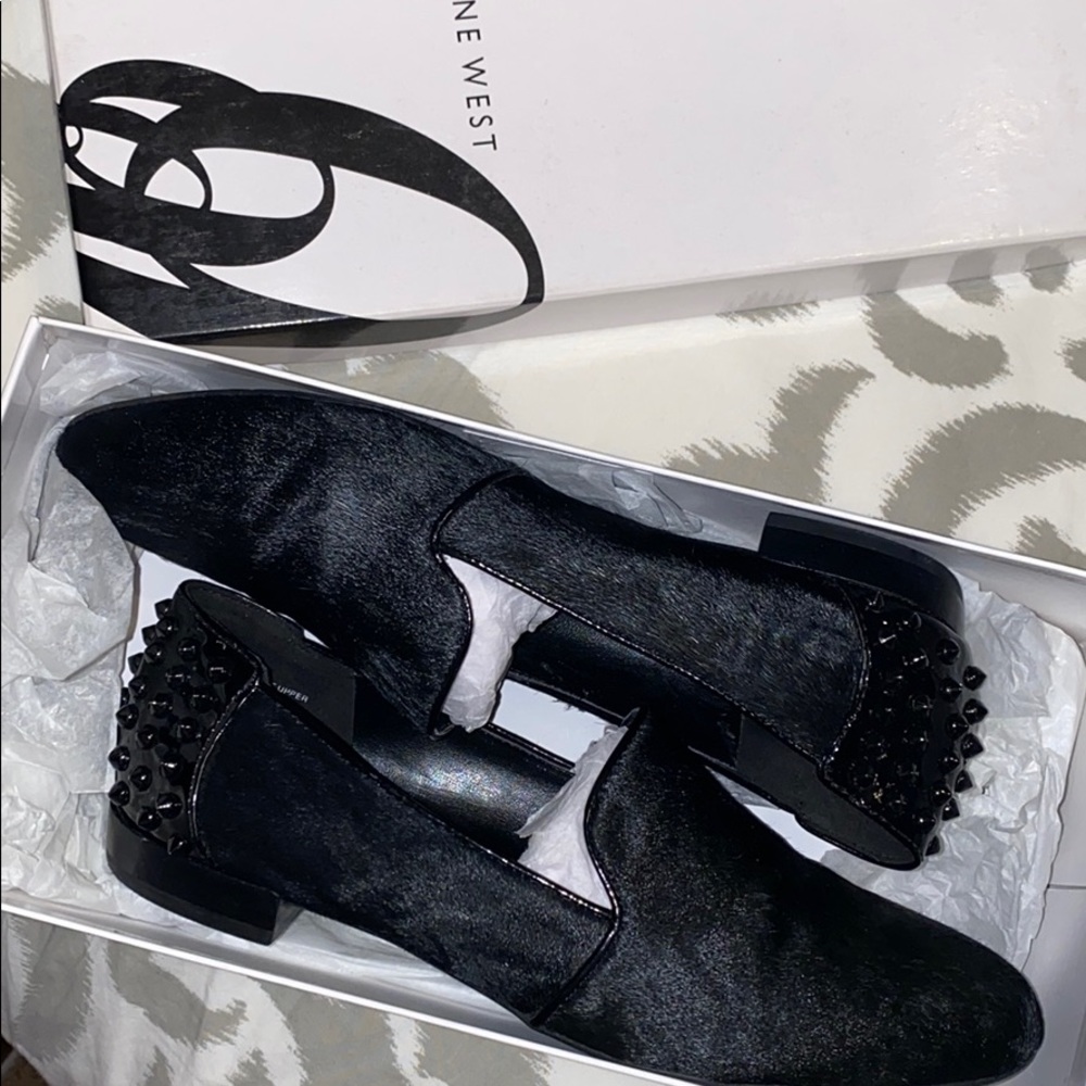 Nine West, black loafers.  With spikes